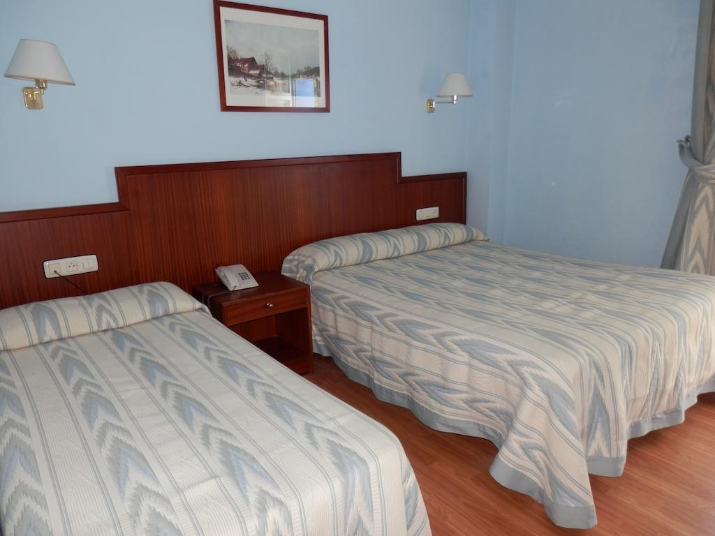 Habitación Doble con cama supletoria - 1 o 2 camas
